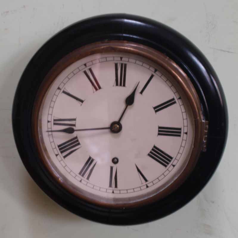 Small ebonised dial clock