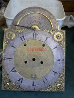 The face of a 4-train bracket clock by Geo Clarke