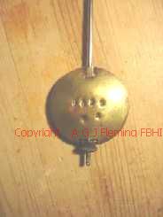 Pendulum of Alabaster clock with dish