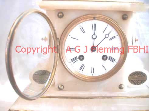Dial of Alabaster clock with dish