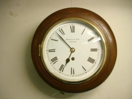 Front view of French & Son dial clock
