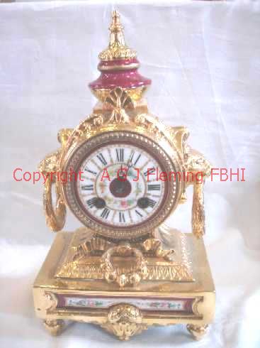 Front view of gilt mantel clock