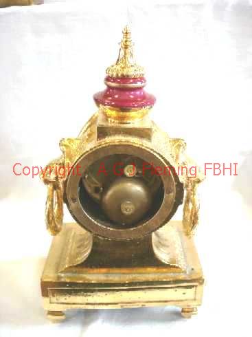 Rear view of gilt mantel clock
