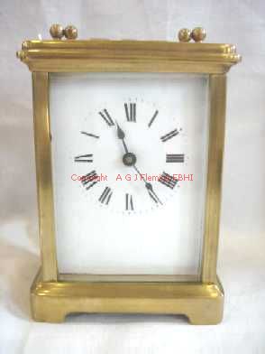 Front view of carriage clock with cylinder platform