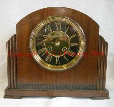 Front view of mantel clock with French rack strike on gong movement