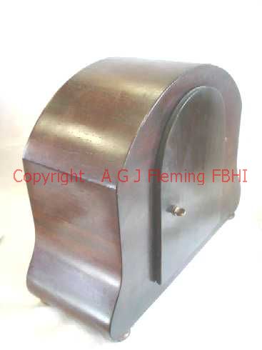 Rear and right side view of mantel clock with German rack strike on gong movement